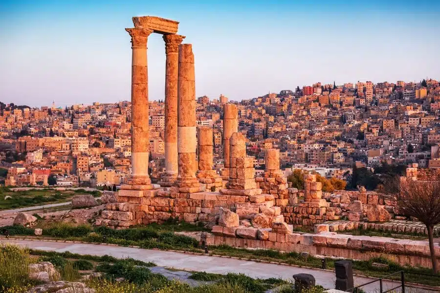 Panoramic view of Amman cityscape highlighting historical and modern buildings.