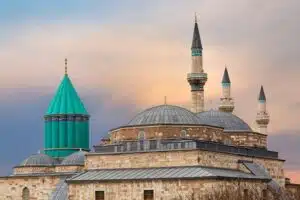 Alaeddin Mosque in Konya, a historic structure with distinctive Seljuk architecture, featuring a large courtyard and intricate stonework.